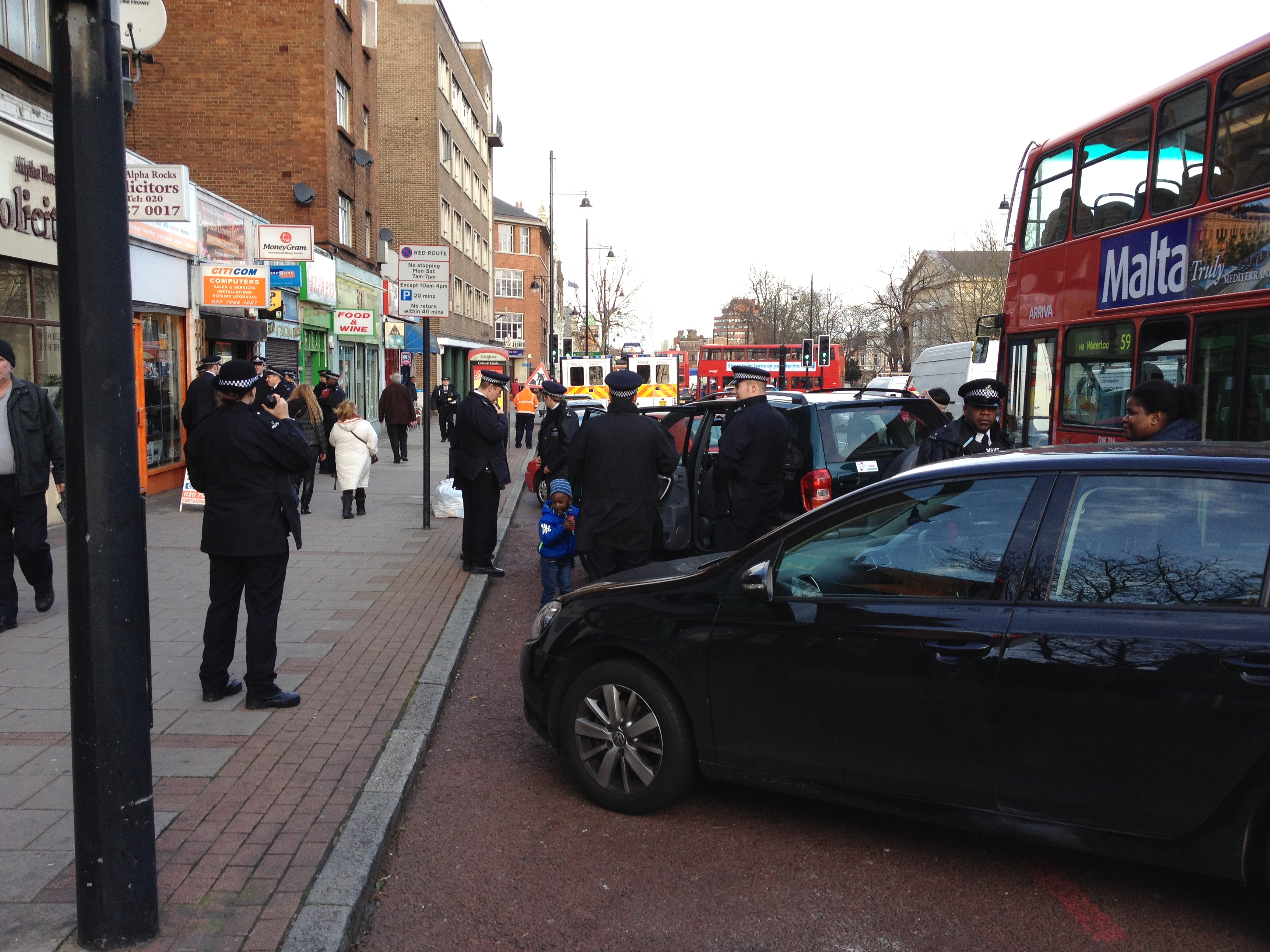 Police stop drivers on Brixton Hill as part of Operation Cubo