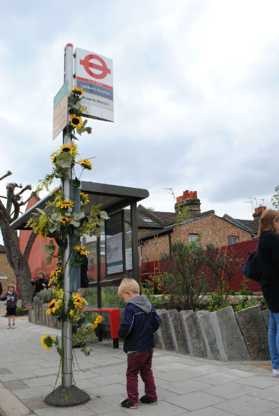A child explores The Edible Bus Stop