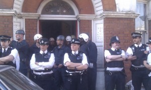 Police outside Oval House, Rushcroft Road. Picture by @Housingforthe99 on Twitter