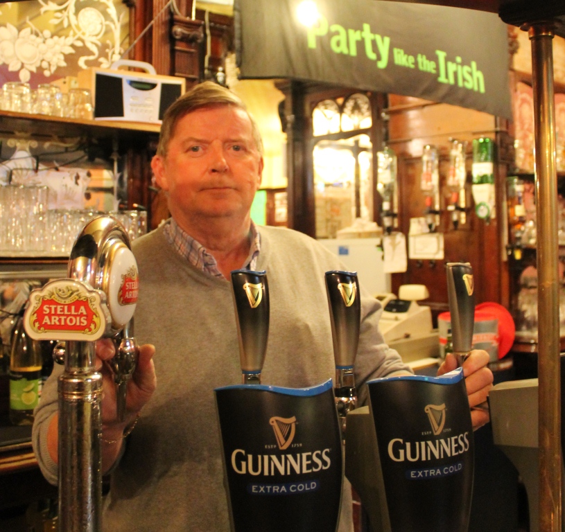 Landlord Brian Fitzgerald behind the bar at the Canterbury Arms