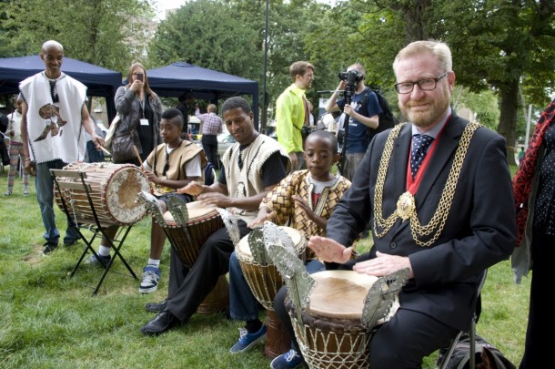 TRIBUTES: Cllr Mark Bennett with young residents in Clapham Park. Picture from Metropolitan Housing