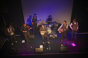 The band playing live.