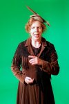 Old lady with feather on green screen