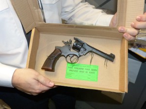 In safe hands? A handgun in custody - photo by Met police.