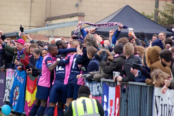 Dulwich Hamlet players celebrate Ashley Pinnock's second goal with fans (Sandra Brobbey for Brixton Blog) 