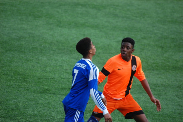 A Lambeth Tiger player (pictured in orange) in action in the Under-14 London FA Youth Cup. 