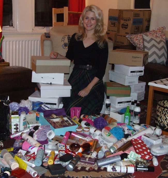 Clare with items collected for Project Shoebox