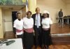 MP Chuka Umunna with three women performers from the play "Linstead Market