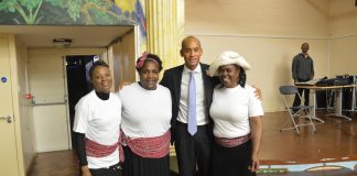 MP Chuka Umunna with three women performers from the play "Linstead Market