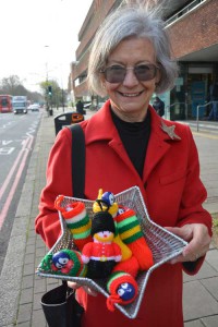 Edith Holtham, chair of the Friends of Tate South Lambeth Library, with some of the knitted decorations