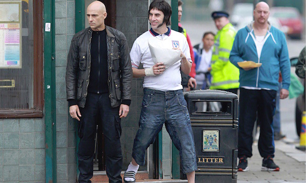 Mark Strong & Sacha Baron Cohen in Grimsby. Courtesy of Columbia Pictures