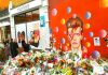 Bowie mural with floral tributes