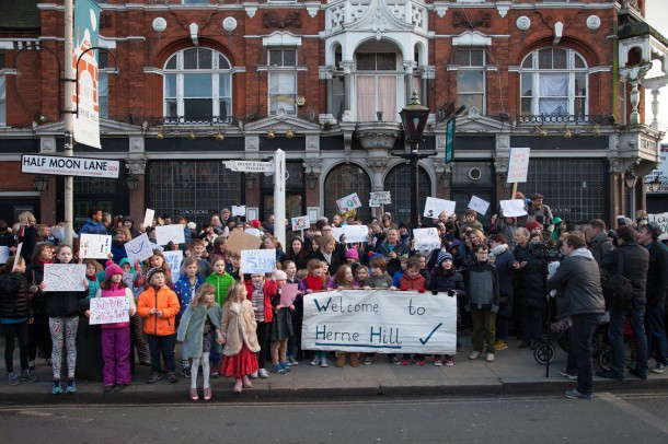 Residents protest outside the Half Moon Pub in Herne Hill