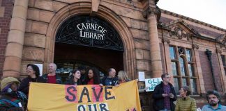 Occupiers on the steps of the Carnegie