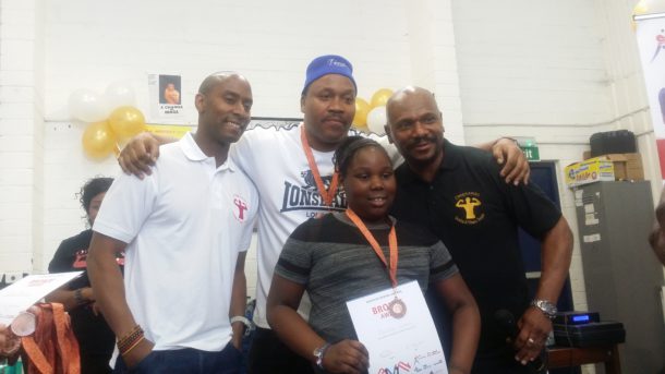 Former world heavyweight champion Tim Witherspoon pictured with Lambeth Boxing Awards winner Shanakaye (aged 9) and Dwaynamics coaches. 
