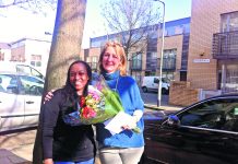 Sophia Ruck Home Start volunteer being presented with flowers