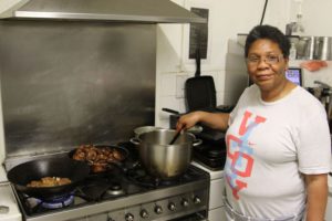 PACCA member June Thompson cooking