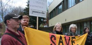 Library protesters outside a council meeting