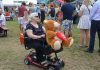 Disability scooter with stuffed bear