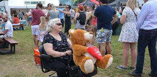 Disability scooter with stuffed bear