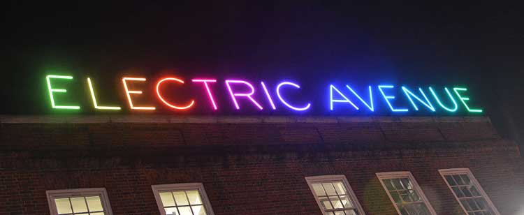 Electric Avenue's new sign on top of Boots