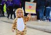 Child protester dressed as tiger