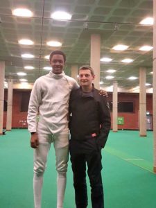 Tarriq Roache with head fencing coach Kamil Golisz