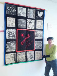 Teri Bullen hanging her historic patchwork of revolutionary women – Change the World! At the Brixton Calling! Exhibition in the 198 Gallery in 2011. Picture: Stefan Szczelkun/Flickr/Creative Commons