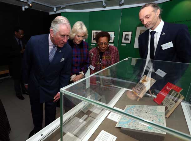Prince Prince of Wales and Duchess of Cornwall are shown the archives.