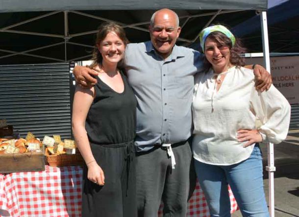 John Gordon of Brixton Market Traders Federation at the market on Sunday with Emma Kendall (Right) and Alex Tildesley, who will continue to help with its management