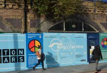 New hoardings on Brixton arches