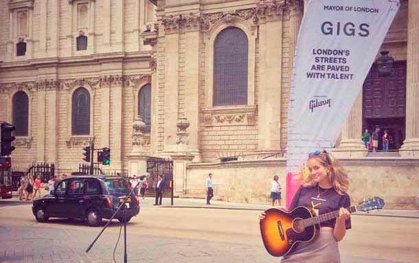 Maeve Fitzpatrick from Brixton is in busking final. Pictured with her guitar.