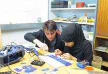 Students with solar panels