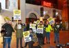 Supporters of the Ritzy strikers brave the cold to picket the cinema urging potential patrons to back the boycott