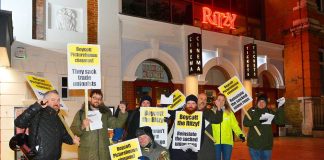 Supporters of the Ritzy strikers brave the cold to picket the cinema urging potential patrons to back the boycott