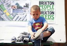 Child in Superman Costume at Brixton Green meeting