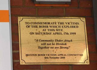 The plaque marking the bombing is today usually behind a row of trolleys