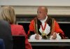 New mayor Christopher Wellbelove presides at the council meeting's new venue