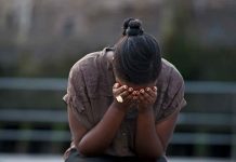 Young Black woman in despair