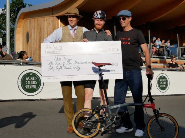 Alex Briggs with cheque for winning Brompton race