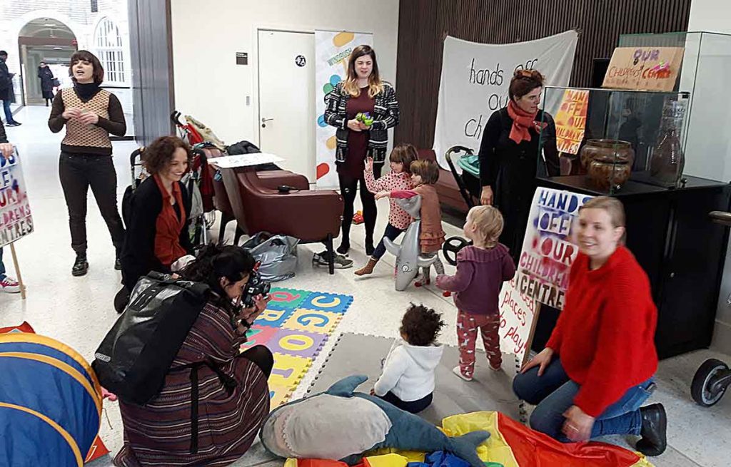 Protesters and their children in the town hall