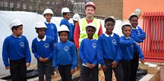 children outside in building site