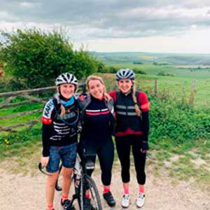 Megan Kent with friends in cycle gear
