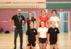 Volley ball players with coach