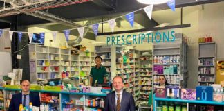 NHS chief Sir Simon Stevens in Brixton's Pavilion pharmacy