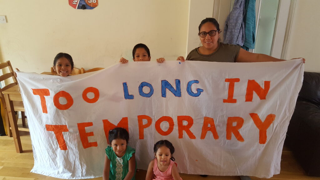 family with banner