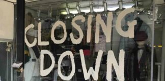closing down sign in shop window