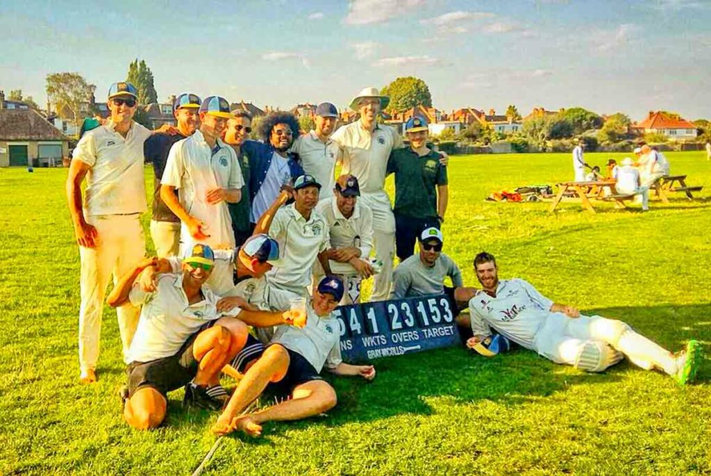 cricketers and supporters relax after a game