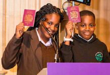children holding UK passports