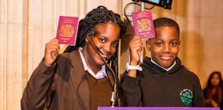 children holding UK passports